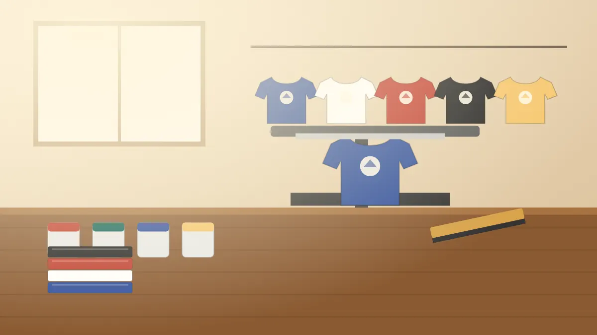 Illustration of a blue t-shirt on a screen-printing press with a squeegee and ink tubs on a workbench